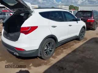 2014 Hyundai Santa Fe z VIN 5XYZU3LA7EG188406, wystawiony jako IAAI lot #43385912 z przebiegiem 92 507 mil mil oraz . Historia ofert i sprzedaży dostępna na DreamBid. Obrazek 4.