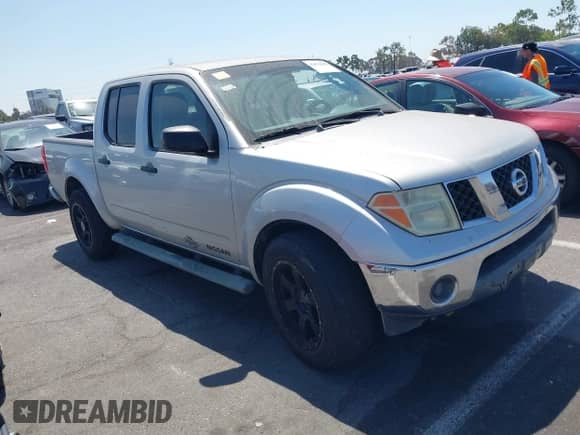 2005 Nissan Frontier SE with VIN 1N6AD07U25C424865, listed as a IAAI auction lot 42871680 with 176,479 mi miles and . Bid and sale history available at DreamBid. Image 1.