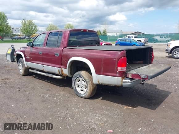 2002 Dodge Dakota с VIN 1B7HG48X92S626936, выставлен на аукционе IAAI как лот 42192429 с пробегом 170 746 миль миль и . История ставок и продаж доступна на DreamBid. Изображение 3.