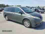 2012 Toyota Sienna XLE with VIN 5TDYK3DC8CS176623, listed as a Copart auction lot 80257225 with 262,472 mi miles and Salvage title. Bid and sale history available at DreamBid. Image 4.