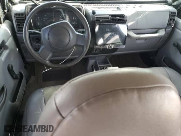 1998 Jeep Wrangler Sport z VIN 1J4FY19SXWP734488, wystawiony jako Copart lot #81896775 z przebiegiem 180 236 mil mil oraz Czysty tytuł • Clean title. Historia ofert i sprzedaży dostępna na DreamBid. Obrazek 8.