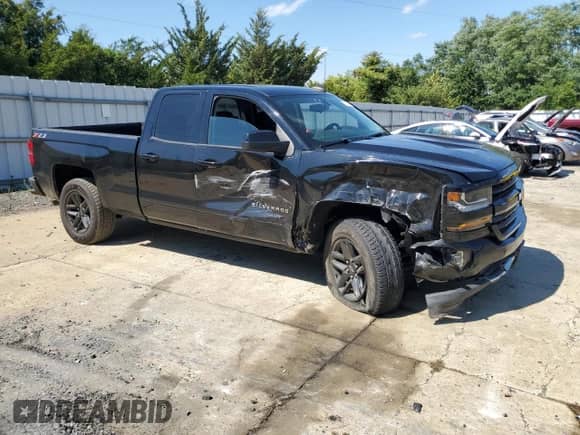 2018 Chevrolet Silverado 1500 LT with VIN 2GCVKREC2J1100761, listed as a Copart auction lot 81624505 with 96,220 mi miles and Salvage title. Bid and sale history available at DreamBid. Image 4.