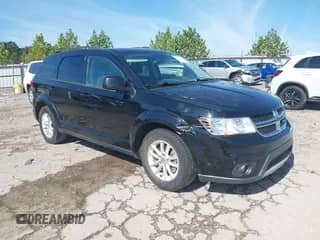 2014 Dodge Journey SXT z VIN 3C4PDCBG5ET270687, wystawiony jako IAAI lot #43308229 z przebiegiem 117 438 mil mil oraz . Historia ofert i sprzedaży dostępna na DreamBid. Obrazek 1.