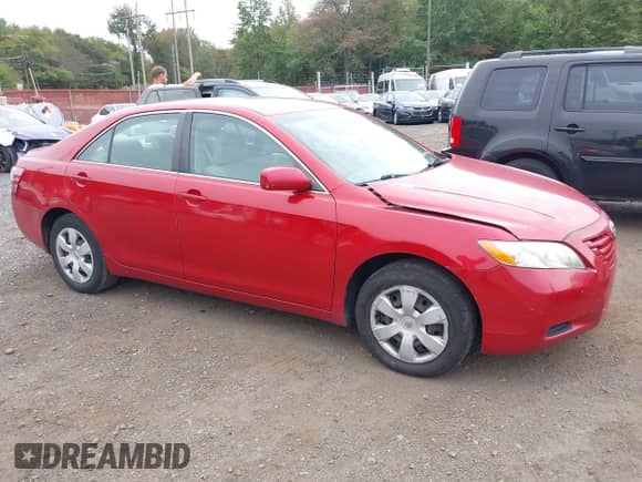 2007 Toyota Camry CE with VIN 4T1BE46K37U174105, listed as a IAAI auction lot 43285726 with 192,853 mi miles and . Bid and sale history available at DreamBid. Image 12.