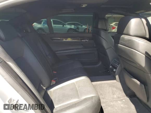 2012 BMW 7 Series 750Li с VIN WBAKB8C5XCC965182, выставлен на аукционе Copart как лот 68873985 с пробегом Не указан миль и Списание • Salvage title. История ставок и продаж доступна на DreamBid. Изображение 10.