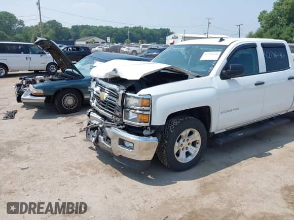 2014 Chevrolet Silverado 1500 LT z VIN 3GCUKREC2EG501235, wystawiony jako IAAI lot #42715436 z przebiegiem 164 781 mil mil oraz . Historia ofert i sprzedaży dostępna na DreamBid. Obrazek 18.