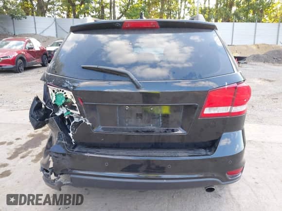 2016 Dodge Journey R/T with VIN 3C4PDDEG8GT183869, listed as a IAAI auction lot 43205537 with 87,272 mi miles and . Bid and sale history available at DreamBid. Image 16.