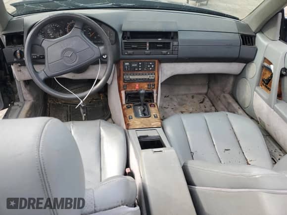 1992 Mercedes-Benz SL с VIN WDBFA66E9NF049522, выставлен на аукционе Copart как лот 80917024 с пробегом 129 754 миль миль и Списание • Salvage title. История ставок и продаж доступна на DreamBid. Изображение 8.