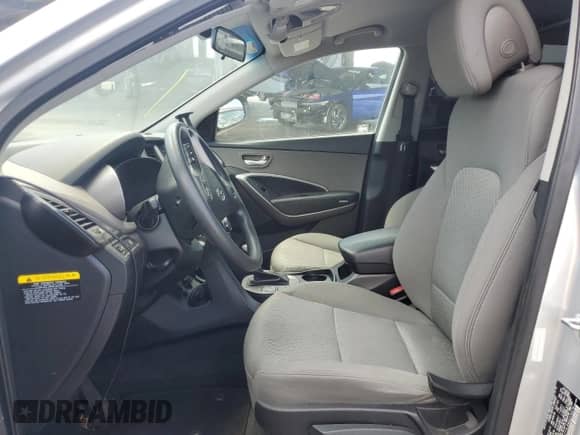 2016 Hyundai Santa Fe with VIN 5XYZT3LB9GG370476, listed as a Copart auction lot 68878545 with 67,676 mi miles and Salvage title. Bid and sale history available at DreamBid. Image 7.