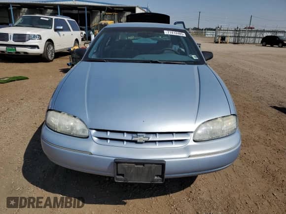 1996 Chevrolet Lumina z VIN 2G1WL52M5T1151271, wystawiony jako Copart lot #71412485 z przebiegiem 242 880 mil mil oraz Szkoda całkowita • Salvage title. Historia ofert i sprzedaży dostępna na DreamBid. Obrazek 5.