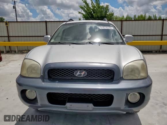 2003 Hyundai Santa Fe GLS z VIN KM8SC13DX3U442040, wystawiony jako Copart lot #61074175 z przebiegiem 20 318 mil mil oraz Szkoda całkowita • Salvage title. Historia ofert i sprzedaży dostępna na DreamBid. Obrazek 5.