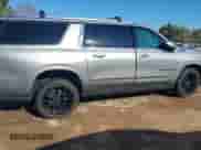 2023 Chevrolet Suburban High Country z VIN 1GNSKGKLXPR235313, wystawiony jako IAAI lot #41216782 z przebiegiem 85 597 mil mil oraz . Historia ofert i sprzedaży dostępna na DreamBid. Obrazek 13.