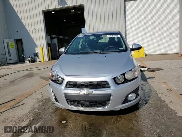 2016 Chevrolet Sonic LTZ with VIN 1G1JE5SB2G4137986, listed as a Copart auction lot 68088785 with 98,566 mi miles and Salvage title. Bid and sale history available at DreamBid. Image 13.