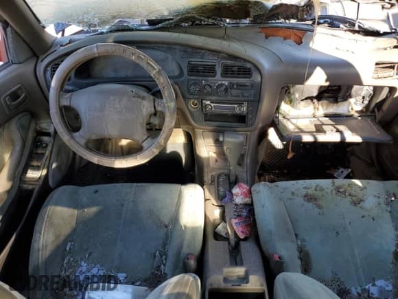 1993 Toyota Camry LE z VIN JT2SK12E8P0149731, wystawiony jako Copart lot #83082154 z przebiegiem 197 590 mil mil oraz Szkoda całkowita • Salvage title. Historia ofert i sprzedaży dostępna na DreamBid. Obrazek 8.