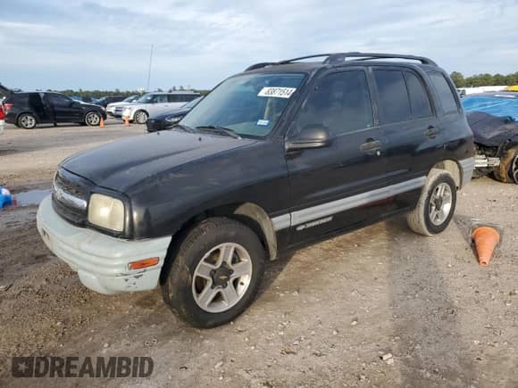 2002 Chevrolet Tracker with VIN 2CNBE13CX26900951, listed as a Copart auction lot 83871514 with 122,718 mi miles and Salvage title. Bid and sale history available at DreamBid. Image 1.