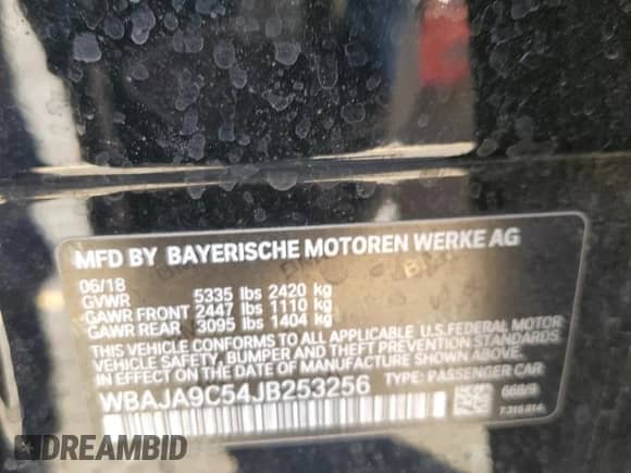 2018 BMW 5 Series 530e with VIN WBAJA9C54JB253256, listed as a Copart auction lot 67865085 with 57,285 mi miles and Salvage title. Bid and sale history available at DreamBid. Image 12.