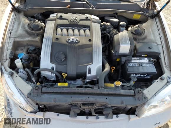 2005 Hyundai XG z VIN KMHFU45E65A408607, wystawiony jako Copart lot #67434225 z przebiegiem 63 967 mil mil oraz Szkoda całkowita • Salvage title. Historia ofert i sprzedaży dostępna na DreamBid. Obrazek 11.