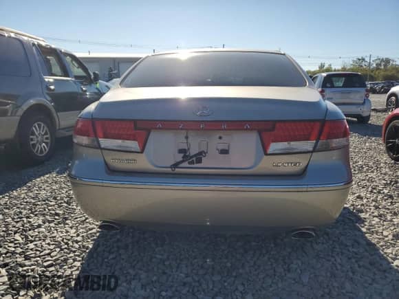 2006 Hyundai Azera SE с VIN KMHFC46F36A034811, выставлен на аукционе Copart как лот 81995815 с пробегом 59 775 миль миль и Чистый • Clean title. История ставок и продаж доступна на DreamBid. Изображение 6.