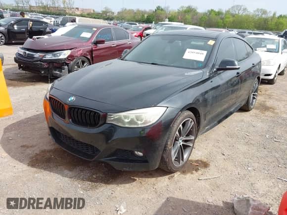 2014 BMW 3 Series 335i Gran Turismo xDrive z VIN WBA3X9C52ED153321, wystawiony jako IAAI lot #42054040 z przebiegiem 145 150 mil mil oraz . Historia ofert i sprzedaży dostępna na DreamBid. Obrazek 17.