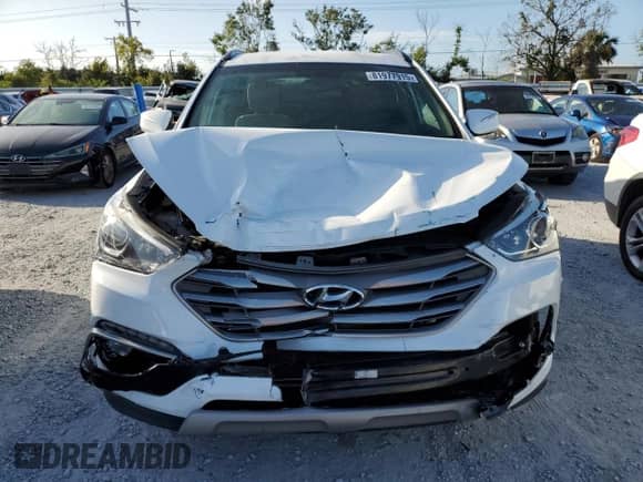 2018 Hyundai Santa Fe 2.4L с VIN 5XYZU3LB4JG514696, выставлен на аукционе Copart как лот 81977915 с пробегом Не указан миль и Списание • Salvage title. История ставок и продаж доступна на DreamBid. Изображение 5.