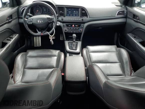 2018 Hyundai Elantra Sport с VIN KMHD04LB5JU723564, выставлен на аукционе Copart как лот 71121095 с пробегом 159 454 миль миль и Списание • Salvage title. История ставок и продаж доступна на DreamBid. Изображение 8.