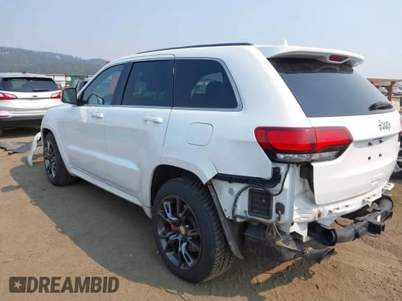 2014 Jeep Grand Cherokee SRT-8 с VIN 1C4RJFDJ1EC512558, выставлен на аукционе IAAI как лот 43102961 с пробегом 63 307 миль миль и . История ставок и продаж доступна на DreamBid. Изображение 3.