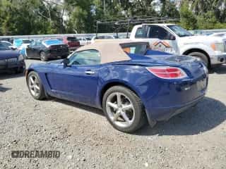 2009 Saturn Sky с VIN 1G8MN35B19Y103192, выставлен на аукционе Copart как лот 85303045 с пробегом 25 592 миль миль и Списание • Salvage title. История ставок и продаж доступна на DreamBid. Изображение 2.