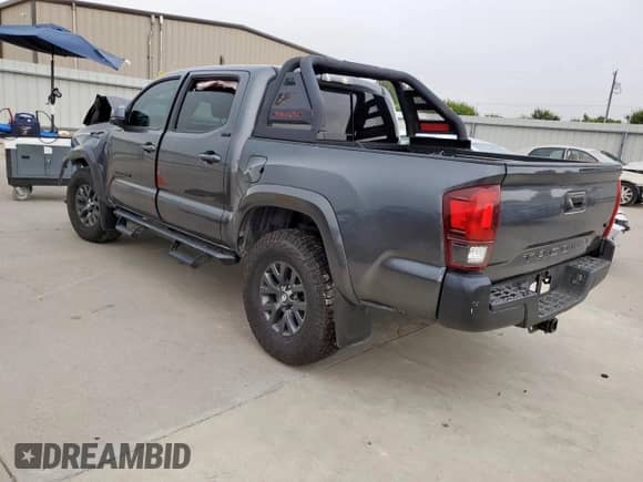 2022 Toyota Tacoma SR5 with VIN 3TMAZ5CN7NM178216, listed as a Copart auction lot 70889745 with 51,289 mi miles and Salvage title. Bid and sale history available at DreamBid. Image 2.
