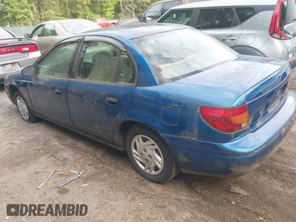 2001 Saturn SL with VIN 1G8ZF52801Z292228, listed as a IAAI auction lot 43331209 with 171,920 mi miles and . Bid and sale history available at DreamBid. Image 3.