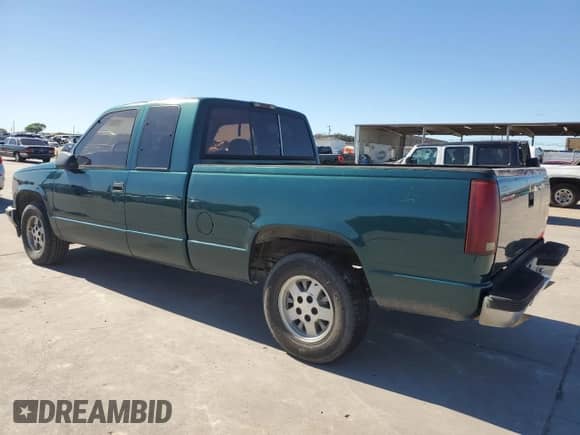 1995 GMC Sierra 1500 with VIN 2GTEC19H9S1560019, listed as a Copart auction lot 79917704 with 259,042 mi miles and Clean title. Bid and sale history available at DreamBid. Image 2.