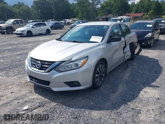 2016 Nissan Altima S z VIN 1N4AL3AP0GC154005, wystawiony jako IAAI lot #42982122 z przebiegiem 151 611 mil mil oraz . Historia ofert i sprzedaży dostępna na DreamBid. Obrazek 2.