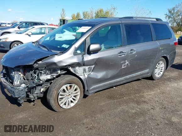 2016 Toyota Sienna XLE with VIN 5TDYK3DC2GS757055, listed as a IAAI auction lot 43483531 with 65,701 mi miles and . Bid and sale history available at DreamBid. Image 2.