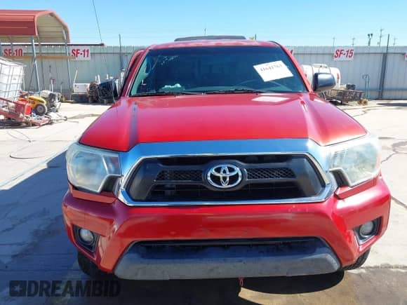 2014 Toyota Tacoma PreRunner with VIN 3TMKU4HN4EM041871, listed as a IAAI auction lot 41641763 with 148,968 mi miles and . Bid and sale history available at DreamBid. Image 13.