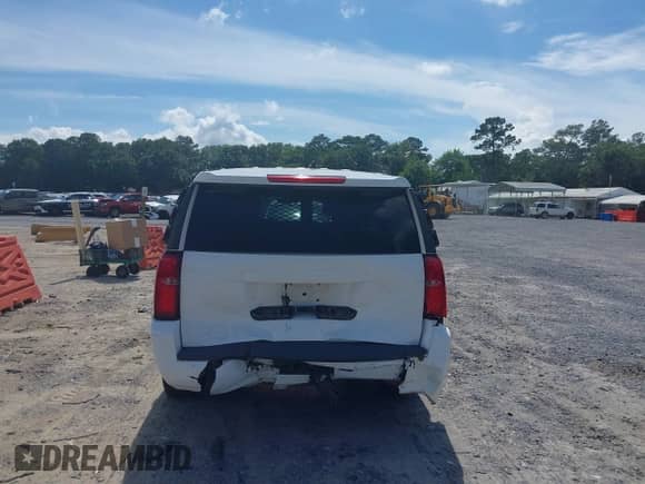 2019 Chevrolet Tahoe Commercial with VIN 1GNLCDEC2KR251607, listed as a IAAI auction lot 42449845 with 154,089 mi miles and . Bid and sale history available at DreamBid. Image 16.