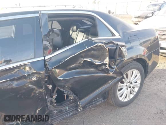 2013 Chrysler 300 with VIN 2C3CCARG5DH659840, listed as a IAAI auction lot 43548831 with 129,743 mi miles and . Bid and sale history available at DreamBid. Image 6.