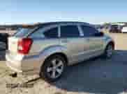 2010 Dodge Caliber Uptown z VIN 1B3CB9HB8AD611181, wystawiony jako Copart lot #86784104 z przebiegiem 119 103 mil mil oraz Szkoda całkowita • Salvage title. Historia ofert i sprzedaży dostępna na DreamBid. Obrazek 3.