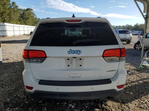 2018 Jeep Grand Cherokee Altitude with VIN 1C4RJEAGXJC197448, listed as a Copart auction lot 84834485 with 55,247 mi miles and Salvage title. Bid and sale history available at DreamBid. Image 6.