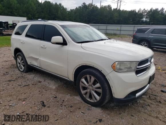 2012 Dodge Durango Crew with VIN 1C4RDJDG6CC294919, listed as a Copart auction lot 68558665 with 265,160 mi miles and Salvage title. Bid and sale history available at DreamBid. Image 4.