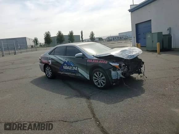 2015 Toyota Camry LE с VIN 4T1BD1FK4FU160911, выставлен на аукционе Copart как лот 71867615 с пробегом 339 207 миль миль и Списание • Salvage title. История ставок и продаж доступна на DreamBid. Изображение 14.