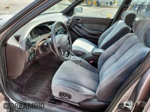 1993 Toyota Camry с VIN 4T1VK13E1PU075530, выставлен на аукционе Copart как лот 64218835 с пробегом 58 871 миль миль и Списание • Salvage title. История ставок и продаж доступна на DreamBid. Изображение 7.