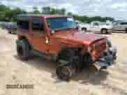 2014 Jeep Wrangler Rubicon with VIN 1C4BJWCG7EL221506, listed as a Copart auction lot 62457345 with 69,606 mi miles and Salvage title. Bid and sale history available at DreamBid. Image 4.