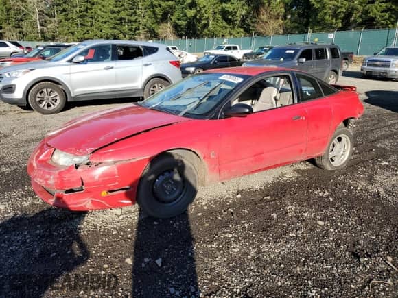 1999 Saturn SC с VIN 1G8ZN1283XZ283513, выставлен на аукционе Copart как лот 41760055 с пробегом Не указан миль и Списание • Salvage title. История ставок и продаж доступна на DreamBid. Изображение 1.
