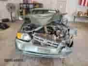 2005 Hyundai Accent GLS z VIN KMHCG35CX5U335467, wystawiony jako Copart lot #61091895 z przebiegiem Nie podano mil oraz Szkoda całkowita • Salvage title. Historia ofert i sprzedaży dostępna na DreamBid. Obrazek 5.