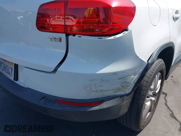 2017 Volkswagen Tiguan S with VIN WVGAV7AX9HK011875, listed as a IAAI auction lot 43359363 with 91,517 mi miles and . Bid and sale history available at DreamBid. Image 14.