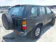 1995 Nissan Pathfinder LE with VIN JN8HD17S9SW056186, listed as a IAAI auction lot 43029568 with 175,559 mi miles and . Bid and sale history available at DreamBid. Image 4.