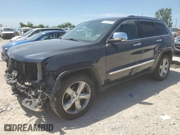 2013 Jeep Grand Cherokee Limited with VIN 1C4RJFBG5DC629923, listed as a Copart auction lot 66639035 with 136,993 mi miles and Salvage title. Bid and sale history available at DreamBid. Image 1.
