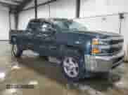 2017 Chevrolet Silverado 2500HD Work Truck with VIN 1GC1KUEG9HF134056, listed as a Copart auction lot 41985655 with 119,199 mi miles and Salvage title. Bid and sale history available at DreamBid. Image 4.