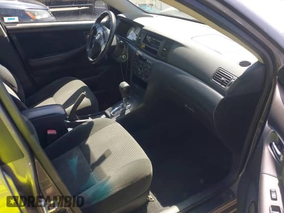 2005 Toyota Corolla CE with VIN 1NXBR30E65Z509923, listed as a IAAI auction lot 42952932 with 208,686 mi miles and . Bid and sale history available at DreamBid. Image 5.