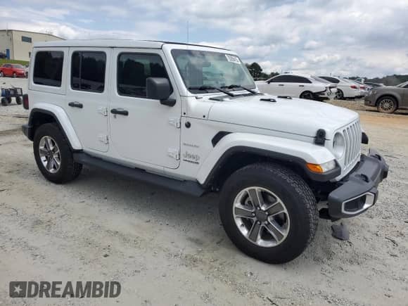 2022 Jeep Wrangler Unlimited Sahara Altitude with VIN 1C4HJXEG3NW148744, listed as a Copart auction lot 70289415 with 21,630 mi miles and Salvage title. Bid and sale history available at DreamBid. Image 4.