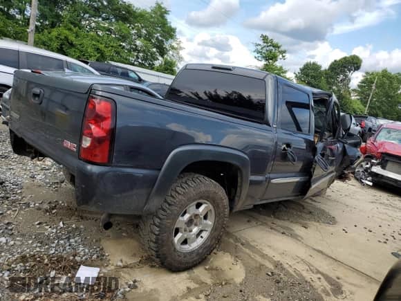 2004 GMC Sierra 1500 SLE z VIN 2GTEK13T841355276, wystawiony jako Copart lot #64751425 z przebiegiem Nie podano mil oraz Szkoda całkowita • Salvage title. Historia ofert i sprzedaży dostępna na DreamBid. Obrazek 3.